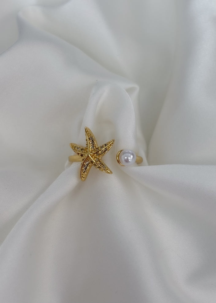 Anillo estrella de mar con Perla