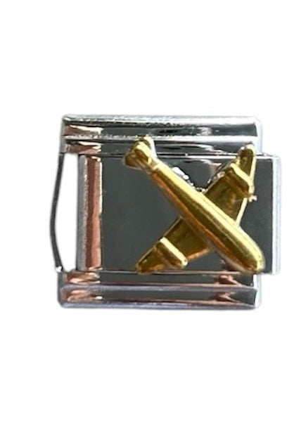Charm avión dorado