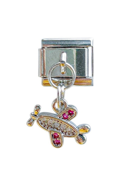 Charm con dije avión con brillos