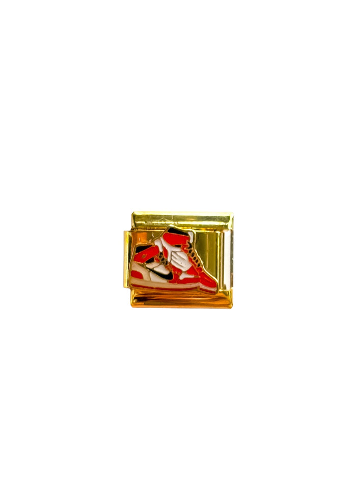 Charm tenis rojos