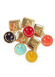 Charm con dije happy face colores